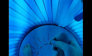 Tanning booth jerking off