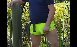 dripping cumshot through shorts walking in the public park