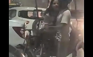 Women blowing a rickshaw puller