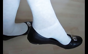 black leather ballet flats and socks, shoeplay and dangling by Isabelle-Sandrine