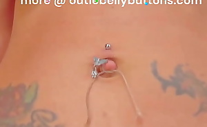 Outie belly button play lightly tied with string