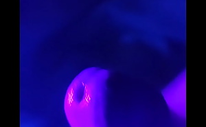 ifoslave playing with his cock in blacklight and cums