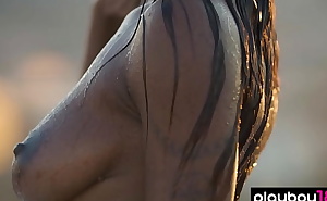 Ebony mermaid Mimi Desuka reveals her big natural boobs in the jacuzzi