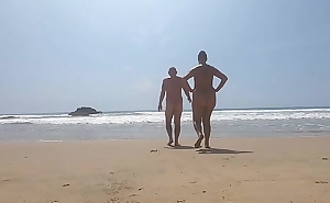 At nudist beach