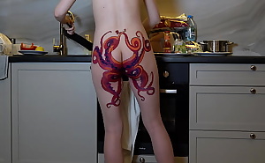 Naked housewife with octopus tattoo on ass cooks dinner on kitchen and ignores you