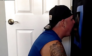 Gloryhole amateur tattooed DILF deepthroats cock at home