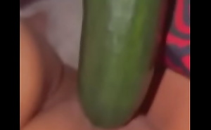 Wife fucks her pussy with cucumber