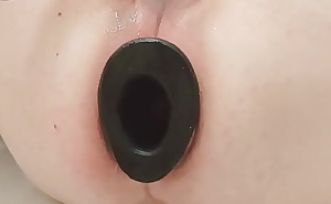 Casey uses 19inch dildo and pighole to hollow out hole