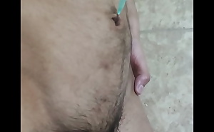 Gay fag playing with his navel and cumming