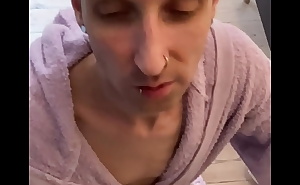 Gay guy in bathrobe sucks a cock