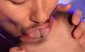Two gay men tongue and spit kissing (Lots of tongue)