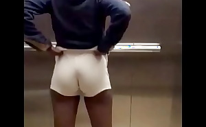 My tight little gym shorts in the elevator