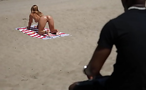 Teasing a stranger at the beach