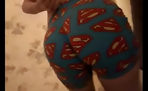 Teen Boy Has Fun In Superman Pajamas