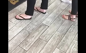 Sexy feet in flip flops