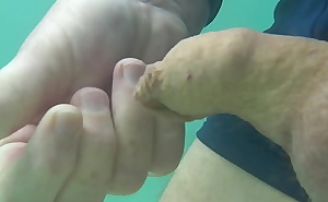 Public underwater golden stream and masturbation with very little ejaculate