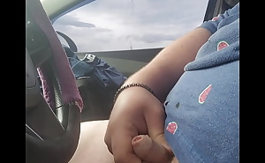 Tugging my cock on the highway