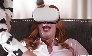 Busty redhead gets vr toying experience