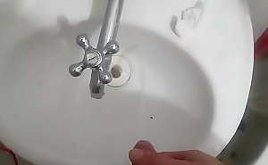 amateur - hairy cock pissing in the sink