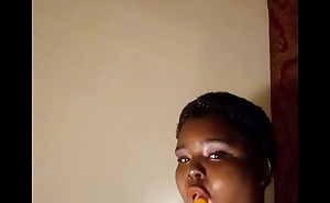 Chubby Ebony enjoys a popsicle