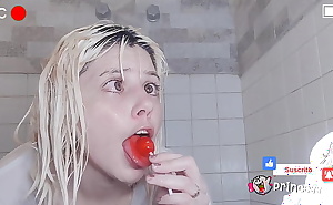 Wet t-shirt with lollipop in the shower