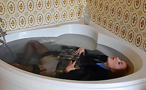 Drenched Doll Sophia Smith Keeps Her Uniform On While Taking Hot Bath!