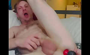Gay slave takes pup dildo all the way