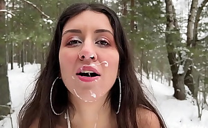 Sex in the snowy forest in winter, cumshot on the face in public