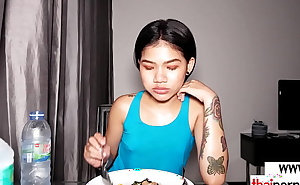 Petite small titted amateur Thai teen Namtam feeding her hungry asian pussy