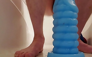 Twink takes massive toy in his ass