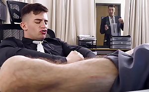 Trevor Brooks masturbates while working in the office, fapping his dick unaware that his boss, Jordan Star catches him in the act.