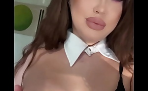 BUSTY MAID SHOWS OFF HER TITS
