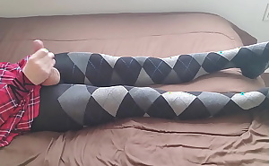 Crossdresser jerking off in plaid dress and argyle tights