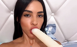 Young Latina playing with dildo in pussy and mouth