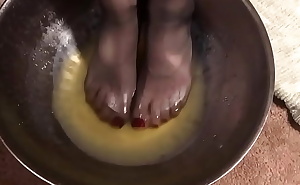 Stale and cold, dirty urine foot wash and enema, in dark stockings